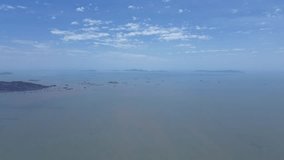 Drone shot of Dinghai Bay, Fuzhou—an ancient Maritime Silk Road node. The island and sea reflect its legacy as a historic trade port with rich cultural heritage. - Powered by Shutterstock - Get 15% off with code: PIKWIZARD15