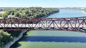 Aerial View Of Long Rusty Steel Truss The Route 90 Bronston Bridge named The Houseboat Capital of the World Bridge Over Calm Cumberland River - Powered by Shutterstock - Get 15% off with code: PIKWIZARD15