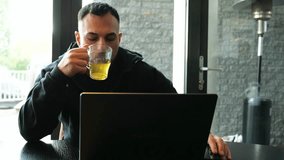 Startup founder working remotely from cozy home office with tea mug. Modern interior, focused workflow, relaxed vibe. Perfect for productivity, tech lifestyle, or remote startup footage. - Powered by Shutterstock - Get 15% off with code: PIKWIZARD15