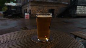 Cinematic shot of rainy city at night, Reflective puddles and blurred bridge in nighttime city - Powered by Shutterstock - Get 15% off with code: PIKWIZARD15