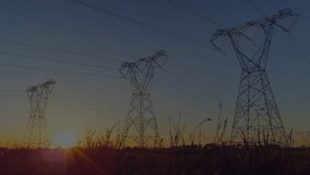 Sunrise spurring neon green, yellow, cyan lines oscillating around steel towers forming graph. Industry, infrastructure, energy, technology, data visualization, power grid, outdoor - Powered by Shutterstock - Get 15% off with code: PIKWIZARD15