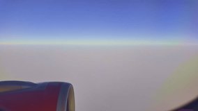 View from airplane window scattered white clouds floating above a vast landscape, with winding rivers below. The deep blue sky and soft cloud formations create a sense of serenity and vastness.  
 - Powered by Shutterstock - Get 15% off with code: PIKWIZARD15