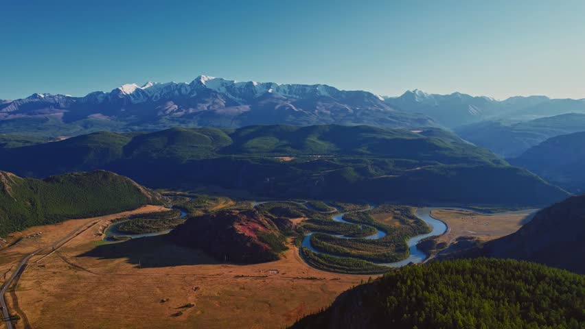 Aerial view Nature reserve Winding River meander in mountains with forest trees, landscape Altai.