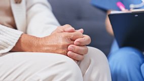 Asian elderly hands caregiver clinic appointment consultation patient support elderly hands clasped lap with caregiver clipboard showing concern and comfort elderly woman hands caregiver hand holding - Powered by Shutterstock - Get 15% off with code: PIKWIZARD15
