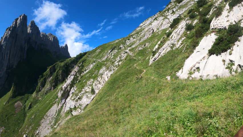 Timelapse in Switzerland mountains with lots of moving clouds