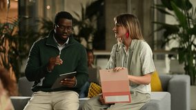 Two diverse teams of colleagues brainstorming and developing new ideas during a meeting in a modern and collaborative office workspace - Powered by Shutterstock - Get 15% off with code: PIKWIZARD15