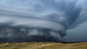 Epic Incredible Supercell Storm Front Rotating With Lightning At Dusk - real footage, long duration, cinematic 4K - Powered by Shutterstock - Get 15% off with code: PIKWIZARD15