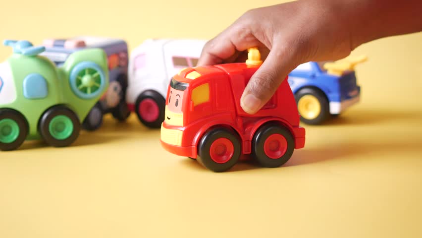 Child Playing with Toy Cars 4k