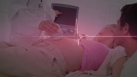 Doctor applying gel and initiating ultrasound scan monitoring fetal heartbeat pulsing EKG overlay. Medical, healthcare, diagnostic, pregnancy, maternity, technology, monitoring - Powered by Shutterstock - Get 15% off with code: PIKWIZARD15