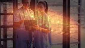 Male doctor tapping tablet, holographic grid sweeping colleague nodding during medical data review. Healthcare, collaboration, innovation, technology, professionalism, diagnostics, hospital - Powered by Shutterstock - Get 15% off with code: PIKWIZARD15