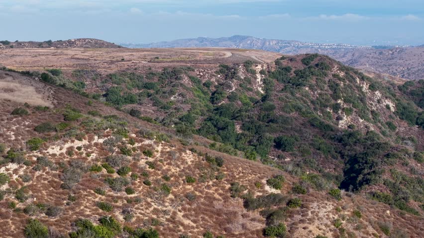 Aerial view of rugged hills and terrain in Southern California