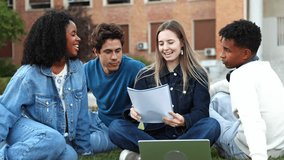 Young multiethnic university students collaborating on a project. Friends sitting on the grass at campus, sharing notes and ideas for homework - Powered by Shutterstock - Get 15% off with code: PIKWIZARD15