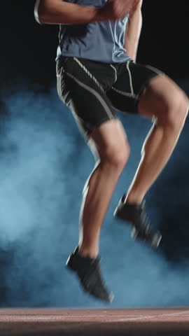 athlete man standing in fog after workout vertical slow motion fullhd moment of peace strength recovery focus resilience reflection motivation inner calm balance lifestyle