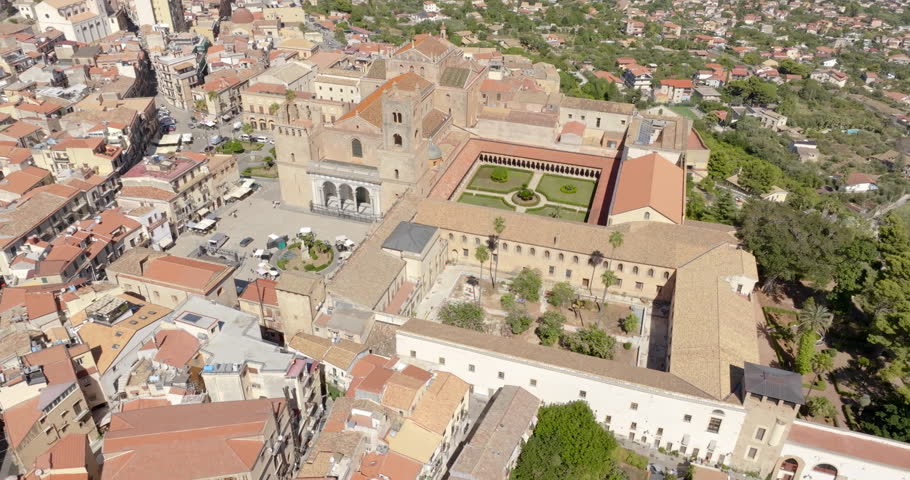 Aerial view of Monreale Cathedral. It is a Catholic church, a masterpiece of Norman architecture, located in the historic center of the town in the metropolitan city of Palermo, Sicily, Italy.