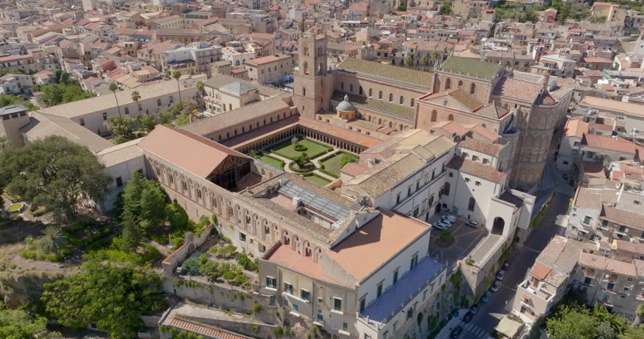 Aerial view of Monreale Cathedral. It is a Catholic church, a masterpiece of Norman architecture, located in the historic center of the town in the metropolitan city of Palermo, Sicily, Italy.