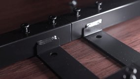 Tightening Screw installing table stand desk on Wooden Surface with Cordless Drill. Precision Work, Manual Labor Concept - Powered by Shutterstock - Get 15% off with code: PIKWIZARD15