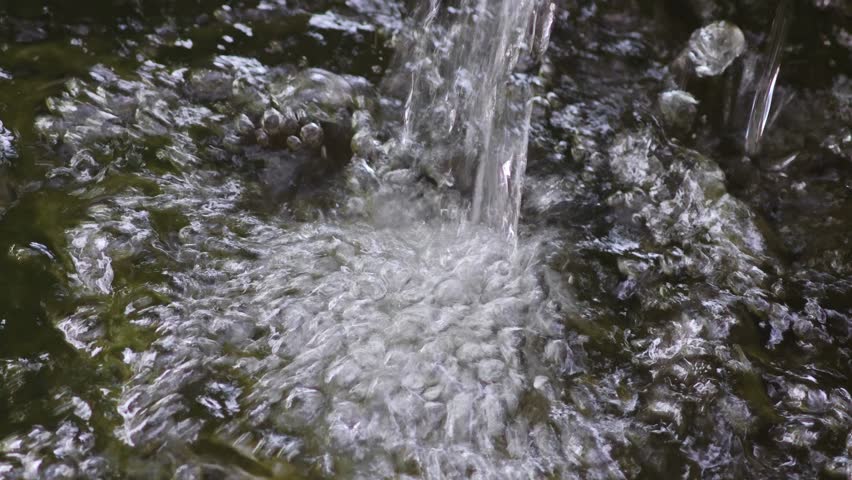 Fountain in a pond on the background