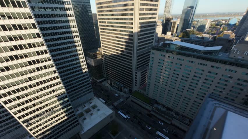 Flying Through Towering Corporate Buildings At The Urban Complex In Downtown Montreal, Quebec, Canada. FPV Shot