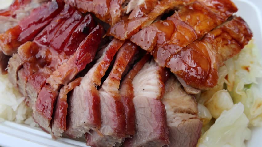 chinese food takeout lunch container with roast duck and glazed pork meat over white rice with cabbage (asian meal plastic) delicious bbq barbecue sweet sour combo platter cut sliced 