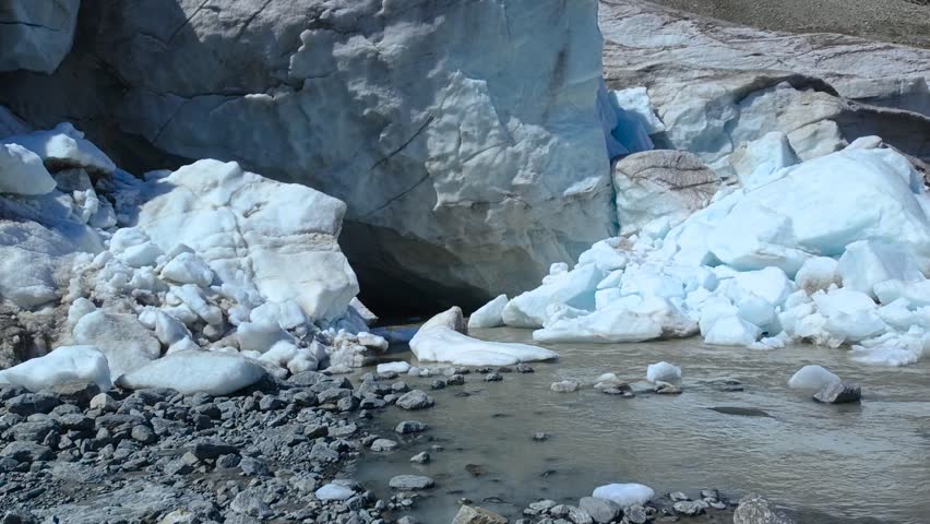 Russia. Altai Mountains. Sofia Glacier, sunny weather. The sound of a mountain river, the sound of the wind.