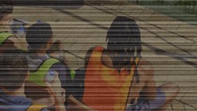 Rowing crew during workout reaching for water bottles at dock, sipping water and adjusting oars. Team sport, athleticism, endurance, teamwork, dynamic, outdoor, synchronized - Powered by Shutterstock - Get 15% off with code: PIKWIZARD15