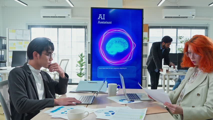 Multiethnic business professionals collaborate in modern office using AI virtual assistant and big data analytics to connect insights, driving strategic innovation through intelligent automation - Powered by Shutterstock - Get 15% off with code: PIKWIZARD15