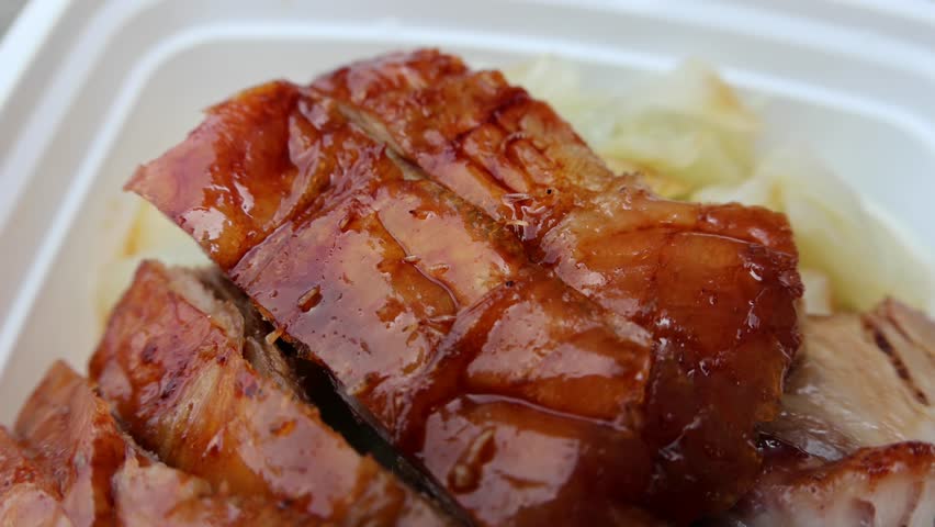chinese food takeout lunch container with roast duck and glazed pork meat over white rice with cabbage (asian meal plastic) delicious bbq barbecue sweet sour combo platter cut sliced 