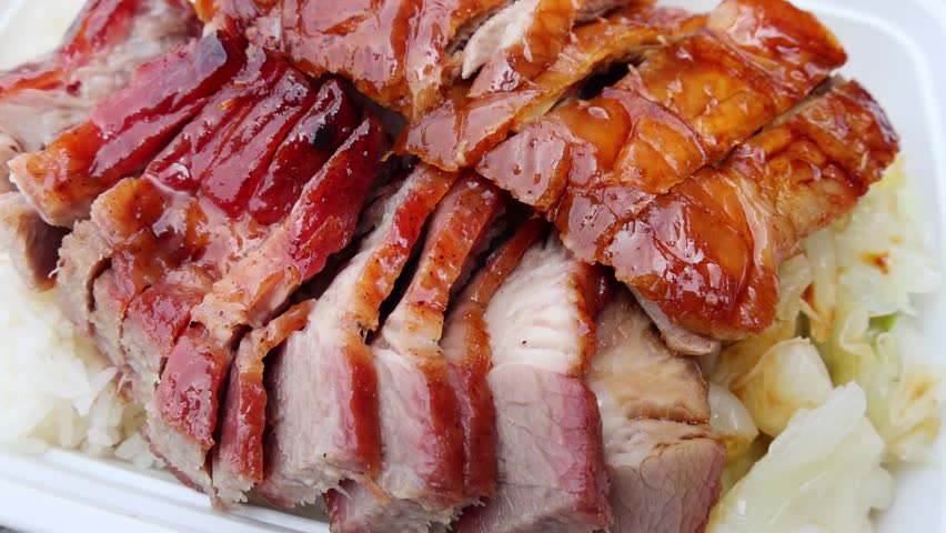 chinese food takeout lunch container with roast duck and glazed pork meat over white rice with cabbage (asian meal plastic) delicious bbq barbecue sweet sour combo platter cut sliced 