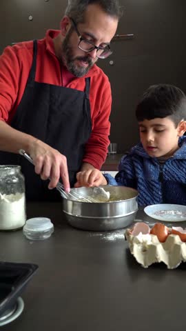 Multigenerational family making christmas cookie dough on a modern kitchen 