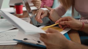 Serious business professional diversity colleagues at table brainstorming informal teamwork managing documents with marketing result data Caucasian businesswoman with Hindu businessman diagram review - Powered by Shutterstock - Get 15% off with code: PIKWIZARD15