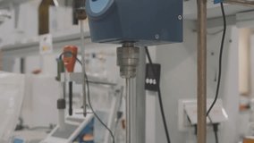 motorized stirrer mixing solutions in beaker, digital control of stirring process for research - Powered by Shutterstock - Get 15% off with code: PIKWIZARD15