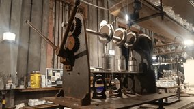 A close-up view of a steampunk-inspired interior featuring vintage metal equipment, gear mechanisms, and shelves filled with bottles and glassware, - Powered by Shutterstock - Get 15% off with code: PIKWIZARD15