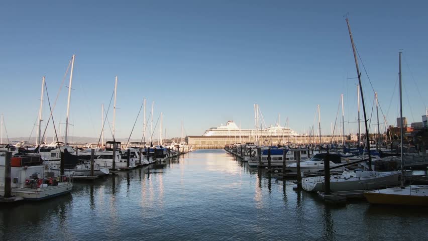 Plaza de California boat harbor with yachts docked at Pier 39 on the water, San Francisco, CA