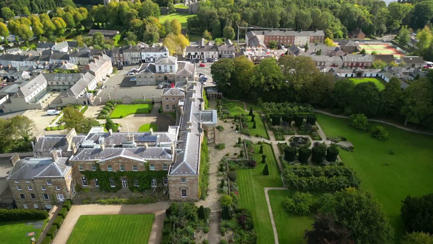 Wide, anti-clockwise 4K 30FPS aerial video of Hillsborough Castle and Gardens in Northern Ireland. Produced in Rec709 color.