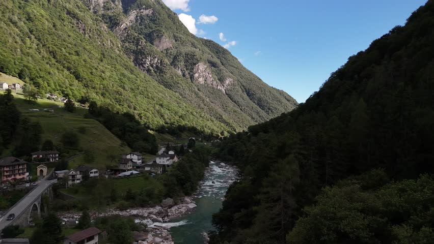 Aerial over Verzasca river Valle Maggia valley Ticino, Switzerland over rocky landscape