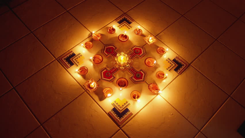 Oil lamps and candles for Diwali festival in Bangalore, India. Warm glow