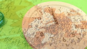 Fading in transparent wooden clock overlay, clock hands rotating over world map showing travel time. Global, navigation, vintage, artistry, exploration, timeliness, geographic - Powered by Shutterstock - Get 15% off with code: PIKWIZARD15