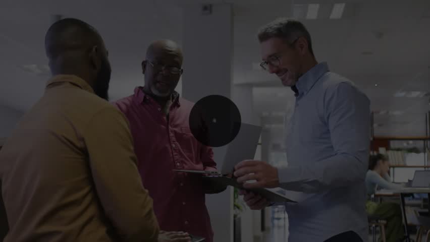 Initiating discussion team gathering around tablet, developing data network overlay in tech office. Technology, collaboration, innovation, connectivity, analytics, digital, corporate - Powered by Shutterstock - Get 15% off with code: PIKWIZARD15