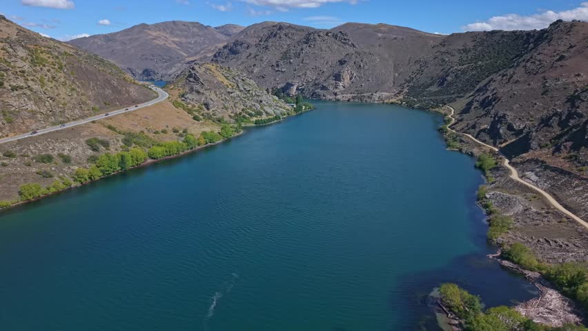 Aerial view of Clutha River gorge with road in Central Otago, New Zealand