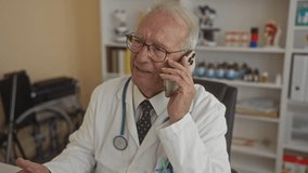 Senior doctor man talking on phone in hospital room wearing white uniform and stethoscope, surrounded by medical equipment and shelves, indicates his experience and professionalism. - Powered by Shutterstock - Get 15% off with code: PIKWIZARD15