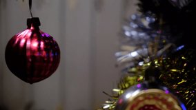 Close up a Christmas tree lights glittering at night. Festively decorations. Christmas tree branches with bright balls on blurred sparkling fairy background. Night scene. Atmospheric fairy mood - Powered by Shutterstock - Get 15% off with code: PIKWIZARD15