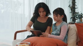 Granddaughter guide grandmother how to use touch screen control tablet. Senior adapt to technology activity communicate new generation kid cross generation gap strengthen family bond. Divergence. - Powered by Shutterstock - Get 15% off with code: PIKWIZARD15