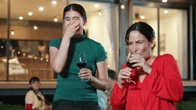 Family celebrate holiday. Mother and grandmother drink wine, cook food while father, grandfather and girl have dinner party food. Outdoor activity spend time together cross generation gap. Divergence. - Powered by Shutterstock - Get 15% off with code: PIKWIZARD15