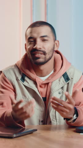 Influencer, face and live stream with man in recording studio for interview, content creation and talk show host. Podcast episode, media and broadcast with person talking for production and speaker