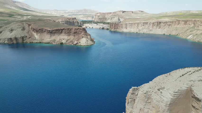 Band E Amir Drone Aerial, Afghanistan. Pristine turquoise lake oasis, lush trees in desert landscape