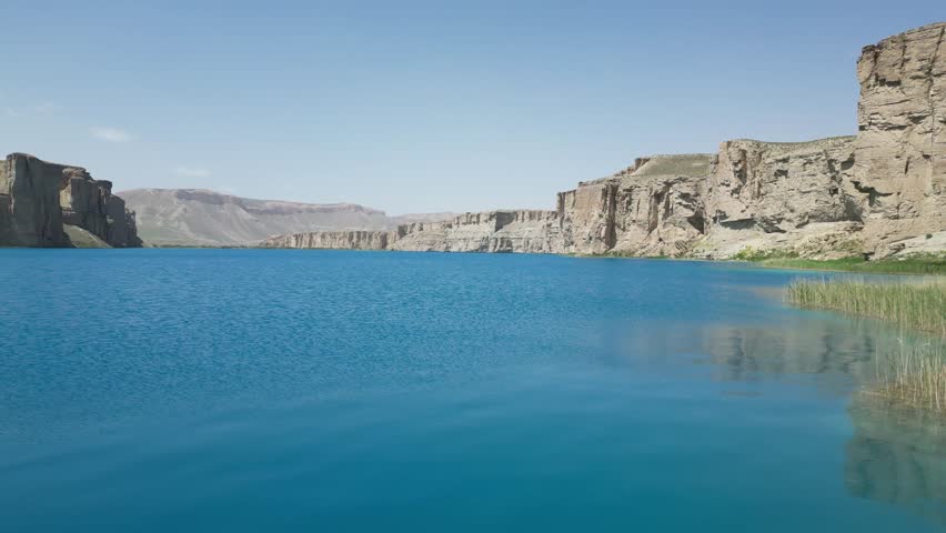 Band E Amir Drone Aerial, Afghanistan. Pristine turquoise lake oasis, lush trees in desert landscape
