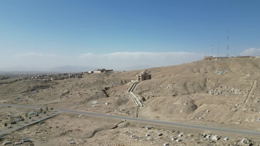 Mausoleum of Shah Shahid, Ghazni, Afghanistan, Aerial View of Ancient historic Landmark Outside of City and hills Landscape, Revealing Drone Shot