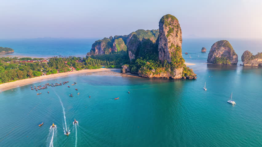 Railay beach with long tail boat in Krabi, Thailand.
