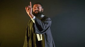 Bearded lawyer stands up for his client inside courtroom, Advocate Participates in Heated Trial Dispute, Legal person tries to keep things fair while hearing, Law Adviser argues strongly during a case - Powered by Shutterstock - Get 15% off with code: PIKWIZARD15