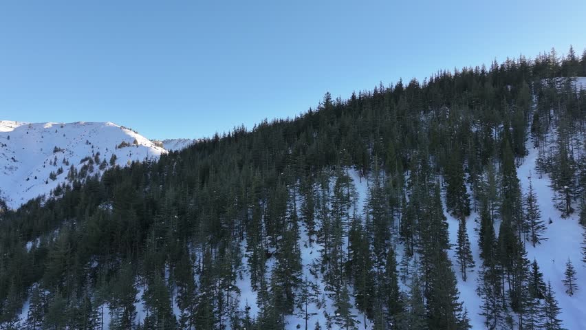 Paktika drone aerial at snowy Hindu Kush mountains - Spin Ghar, Spīn Ghar mountain at Pakistan Afghanistan border.